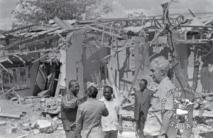 Joshua Nkomo, journalists and visitors viewing the damage after the Freedom Camp attacks