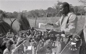 Teacher conducting his class in the open in JZ Moyo Camp