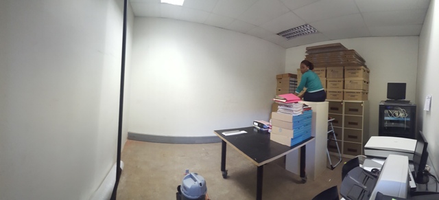 Reorganising the space in the archival sorting room during the archival refurbishment, March 2016