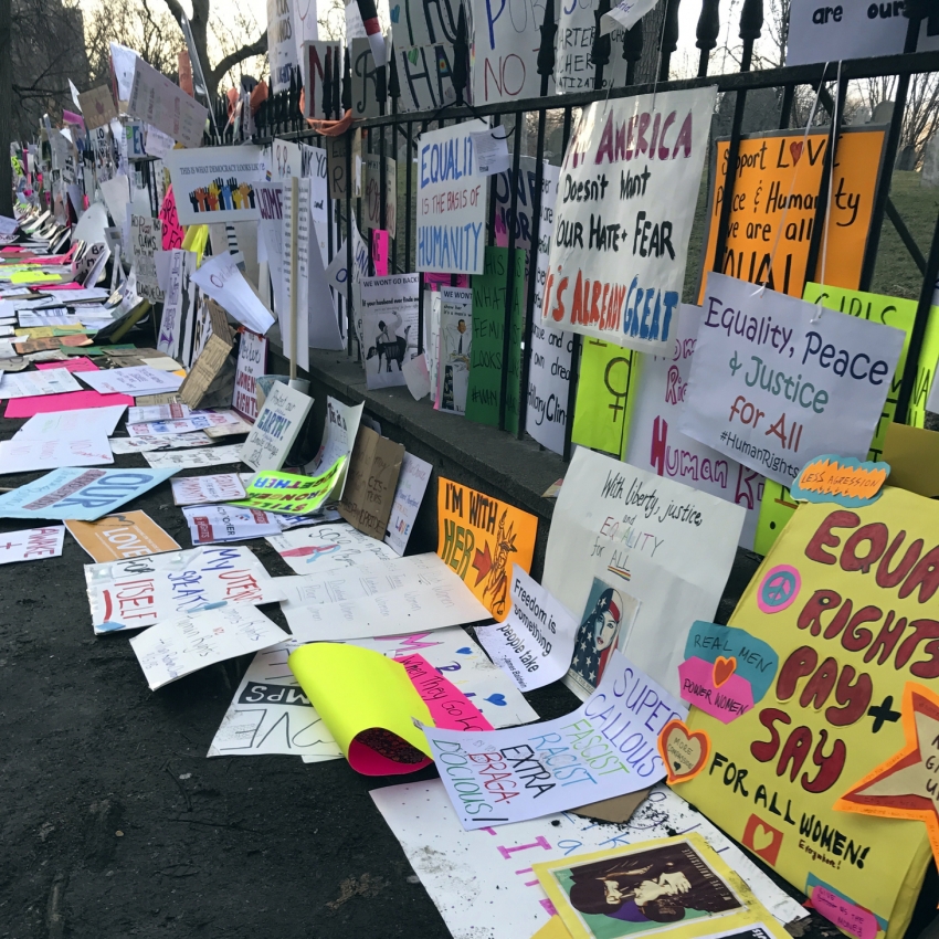Signs line the fence surrounding Boston Common after the Boston Women's March for America on Saturday. Some of those signs could end up in an archive at Northeastern U.Dwayne Desaulniers, AP Images