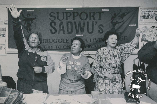 Black and white photograph of delegates at the launch of the Transvaal South African Domestic Workers Union Living Wage Campaign, taken by Anna Zieminski, September 3, 1988. Archives in SAHA collection as AL2547_11.9.10.